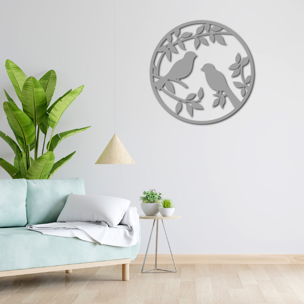 Lovers' Perch wall art displayed in a modern living room with green plants and minimalist decor