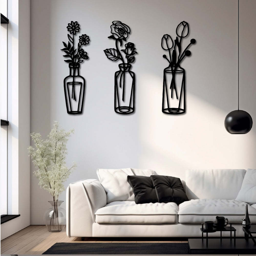 Set of three steel wall art silhouettes featuring vases with floral designs, adding a modern and elegant touch to home decor