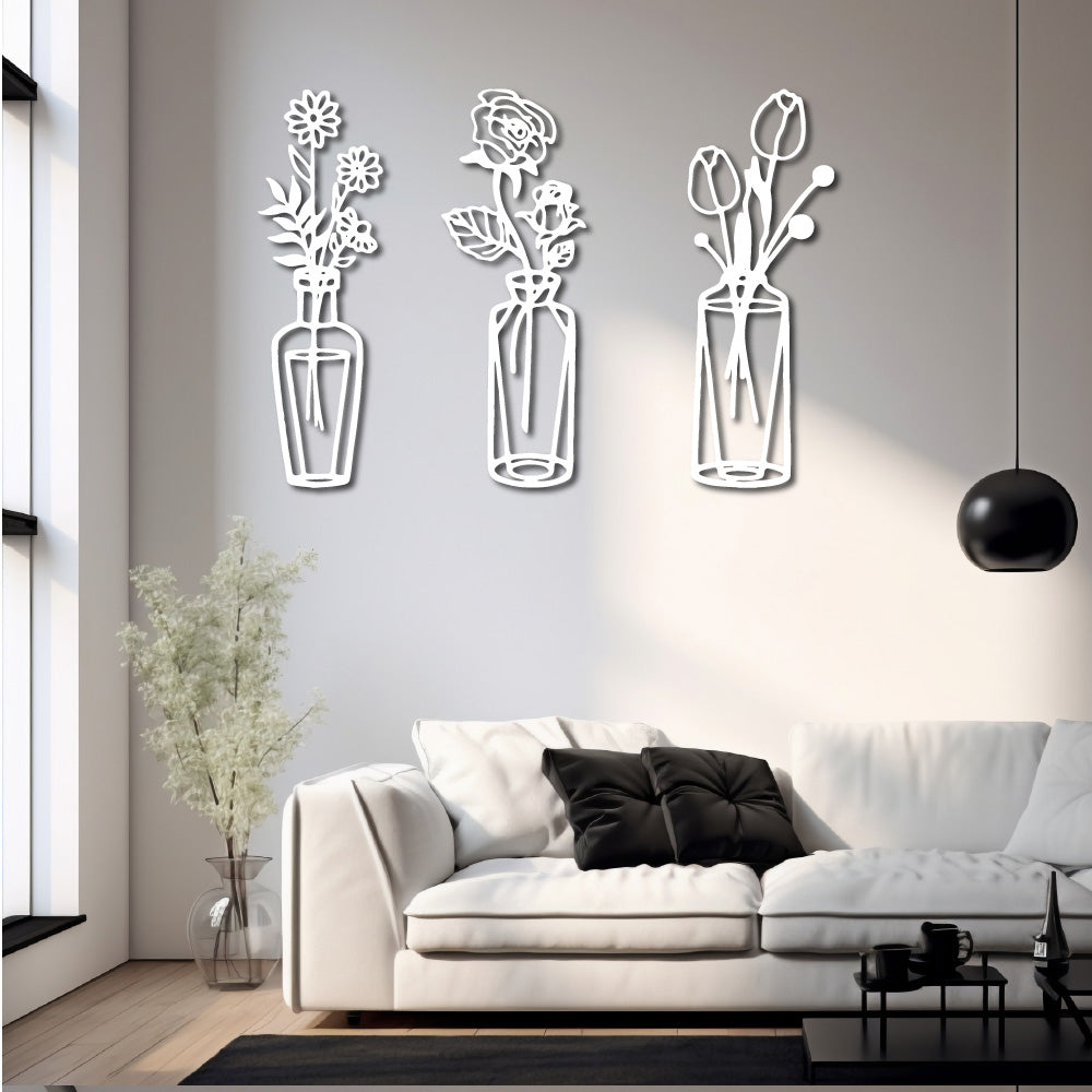 Set of three steel wall art silhouettes featuring vases with floral designs, adding a modern and elegant touch to home decor