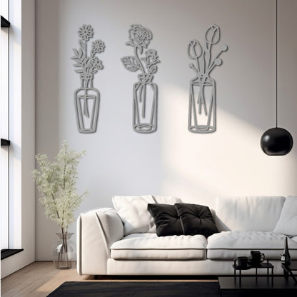 Set of three steel wall art silhouettes featuring vases with floral designs, adding a modern and elegant touch to home decor